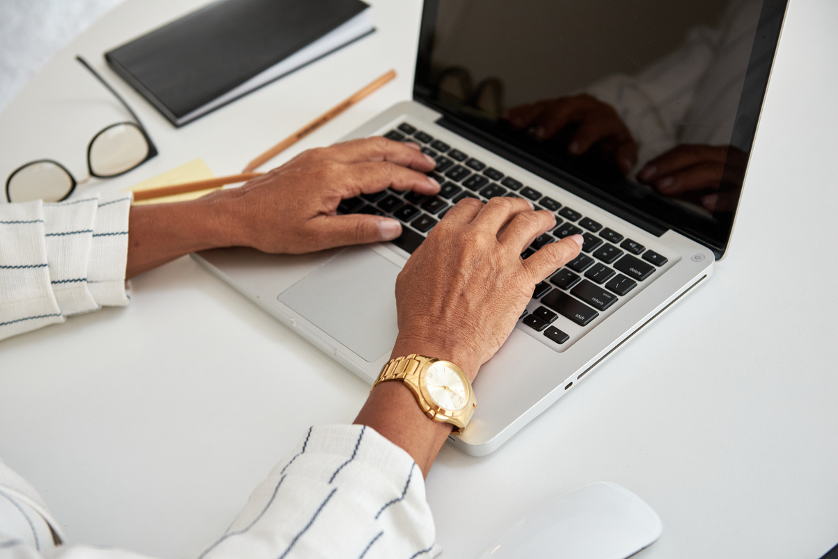 Entrepreneur Typing on Their Laptop